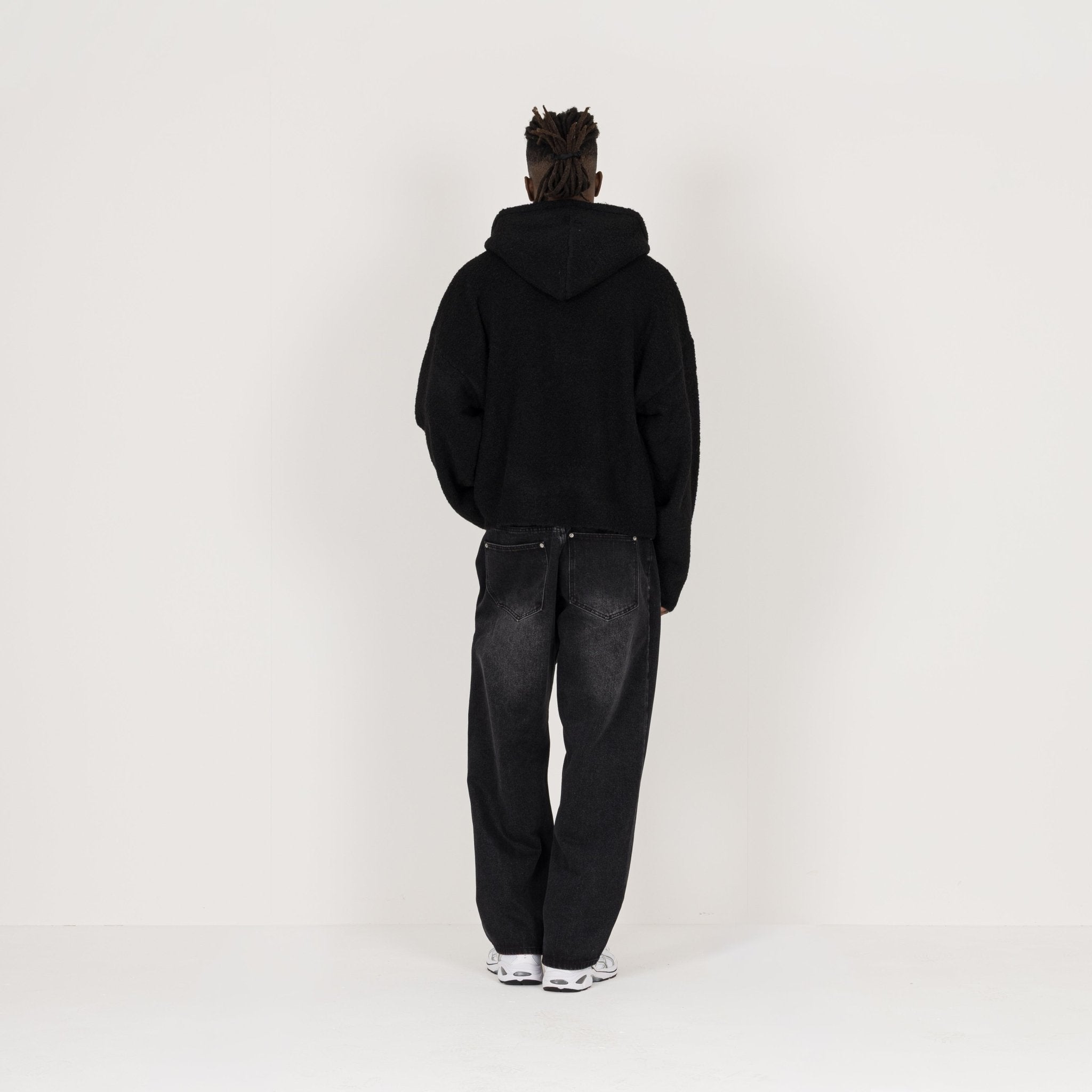 Model Back view of Destructive Bouclé Black ZIP Hoodie